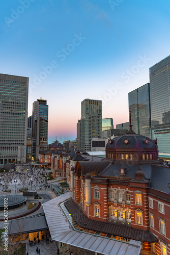 View of Tokyo station building at twilight time. Marunouchi business district, Tokyo, Japan.