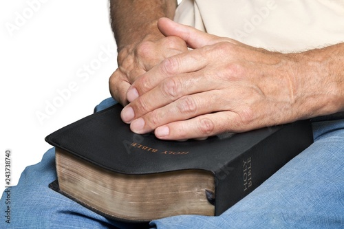 Closeup on Senior's Hands on Bible