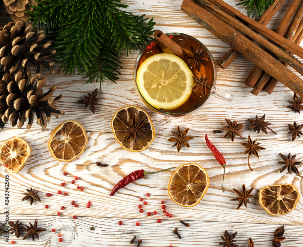 Winter drink with spices on festive new year background Winter drink with spices on festive new year background
