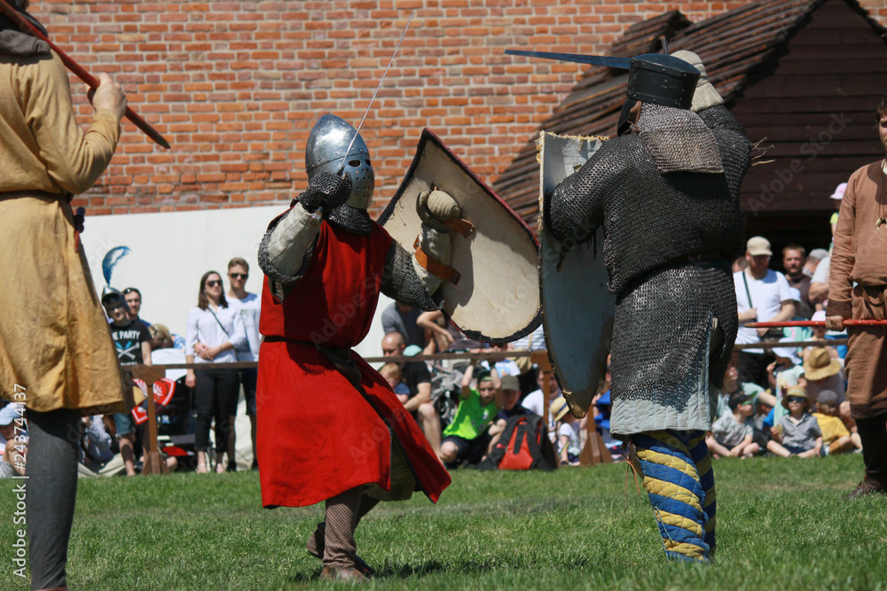 Knights fighting on tournament in Czersk castle, south of Warsaw, Mazovia, Poland - obrazy, fototapety, plakaty 