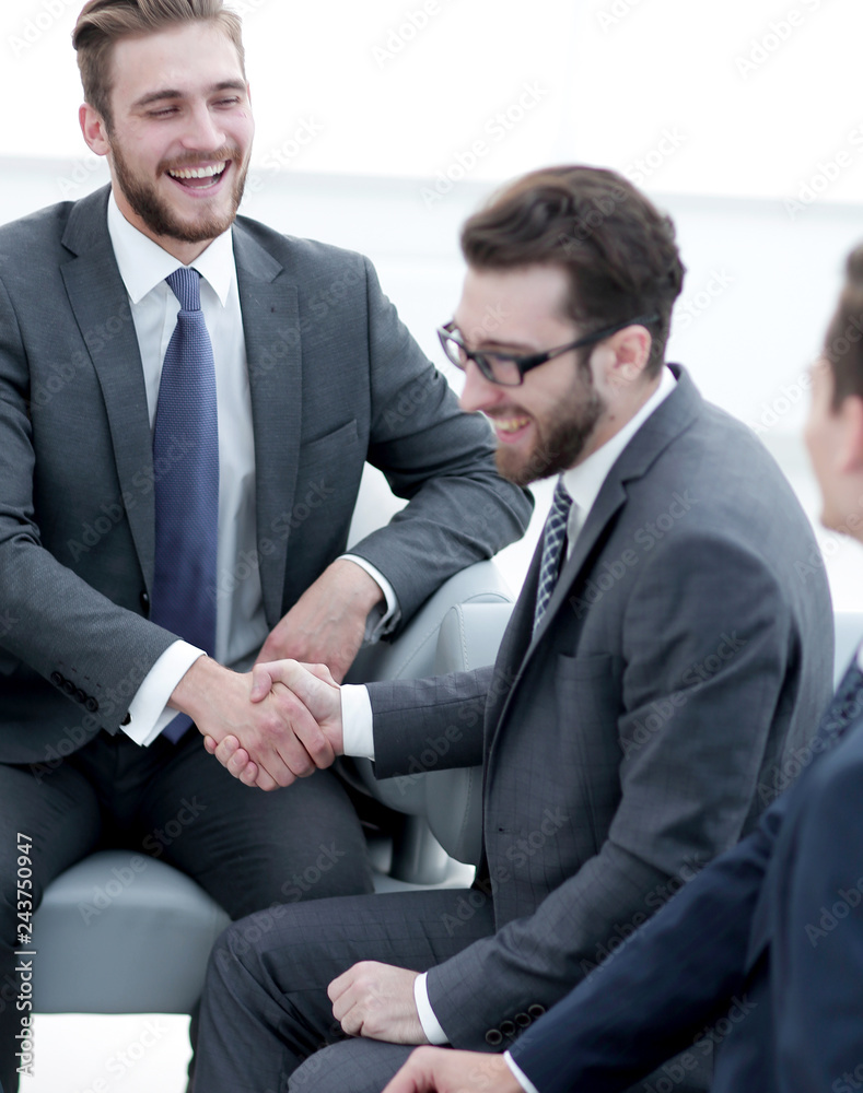 handshake business people in the office. handshake business people in the office.