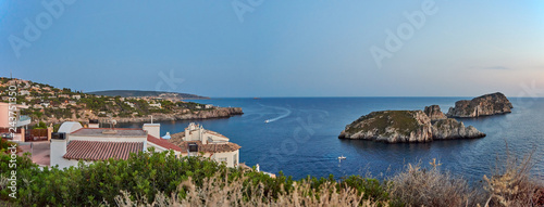 Spain. Mallorca. Santa Ponca. Panorama of the coast and Malgrat Islands in the shadow of the sunset photo