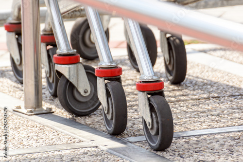Close-up of old shopping cart wheels, Concept of shopping © steuccio79