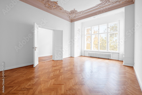 empty room, luxury apartment / flat in old building with wooden floor and stucco © hanohiki