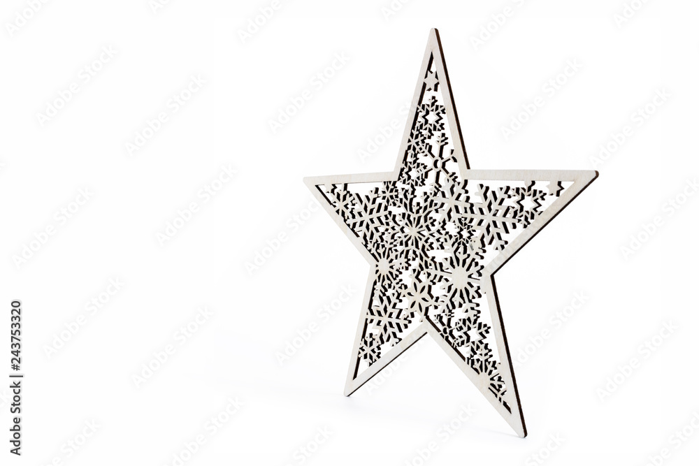 Obraz premium White star as Christmas decoration made and cut out with laser from wood