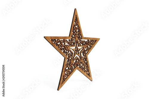 Brown star as Christmas decoration made and cut out with laser from wood