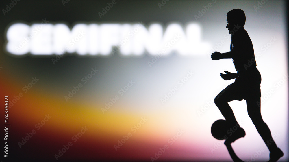 SEMIFINAL Tittle and Silhouette of Soccer player. Football photo, Edit space