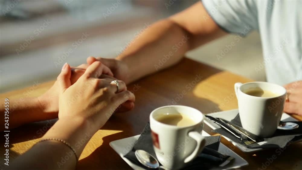 Happy Young Couple Holding Hands. They Enjoy Spending Time Together. Happy Young Couple Holding Hands. They Enjoy Spending Time Together.
