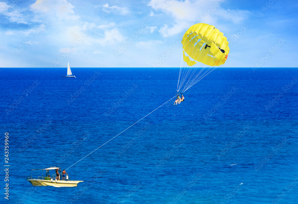 Parasailing in Aegean Sea in city of Rhodes (Rhodes, Greece) Parasailing in Aegean Sea in city of Rhodes (Rhodes, Greece)
