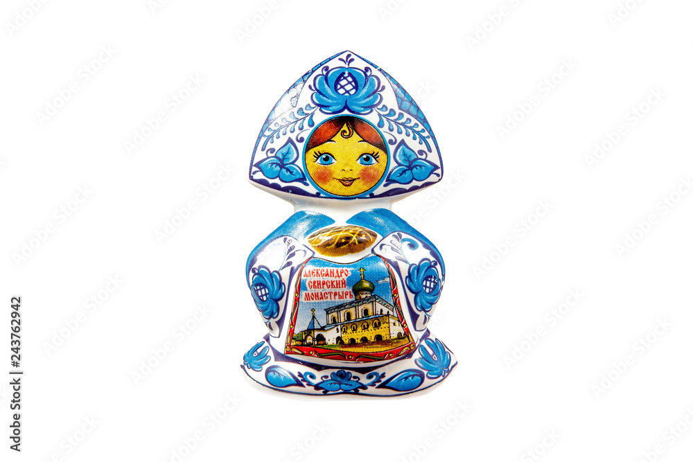 ceramic souvenir toy in the form of matryoshka with beautiful color painting on isolated white background reflecting the national Russian culture ceramic souvenir toy in the form of matryoshka with beautiful color painting on isolated white background reflecting the national Russian culture