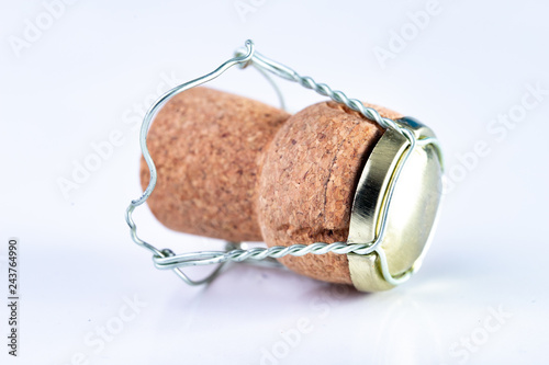Champagne cork and metal basket on the table. Special closure from sparkling wine.