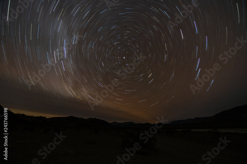 Star trails looking at the North Star on a very dark night, Racetrack Valley, Death Valley National Park, California