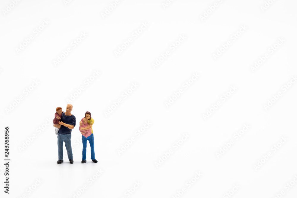 Miniature people, family and children isolated on white background. International Day of Families Miniature people, family and children isolated on white background. International Day of Families