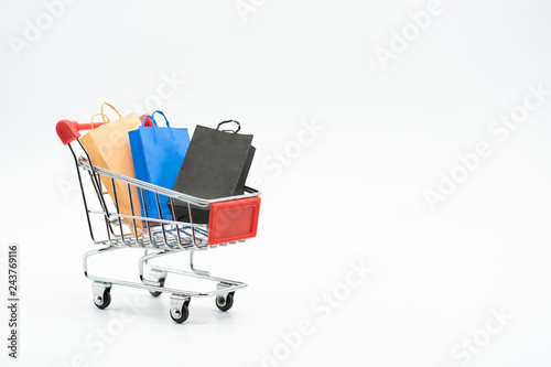 Shopping cart, and shopping bags isolated on white background using as background. Black Friday, boxing day, mid year sales,and year end sales.