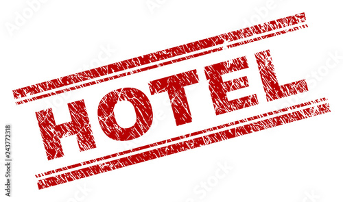 HOTEL seal print with distress style. Red vector rubber print of HOTEL caption with unclean texture. Text caption is placed between double parallel lines.