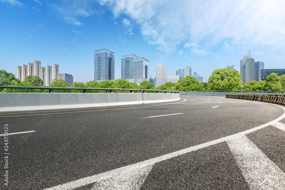 Obraz premium Urban road and modern commercial buildings in Shanghai
