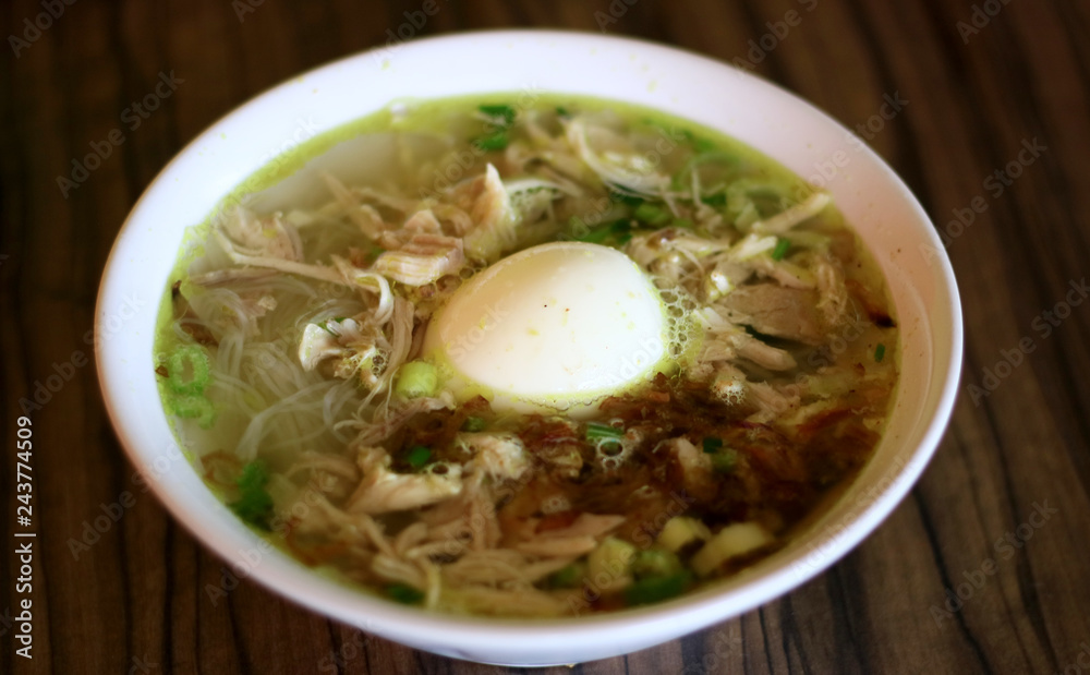 Soto ayam or Indonesian Chicken Soup with boiled egg. Soto ayam or Indonesian Chicken Soup with boiled egg.