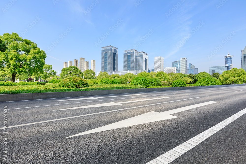 Urban road and modern commercial buildings in Shanghai