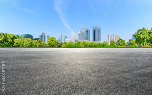 Panoramic city skyline and buildings with empty asphalt road in Shanghai