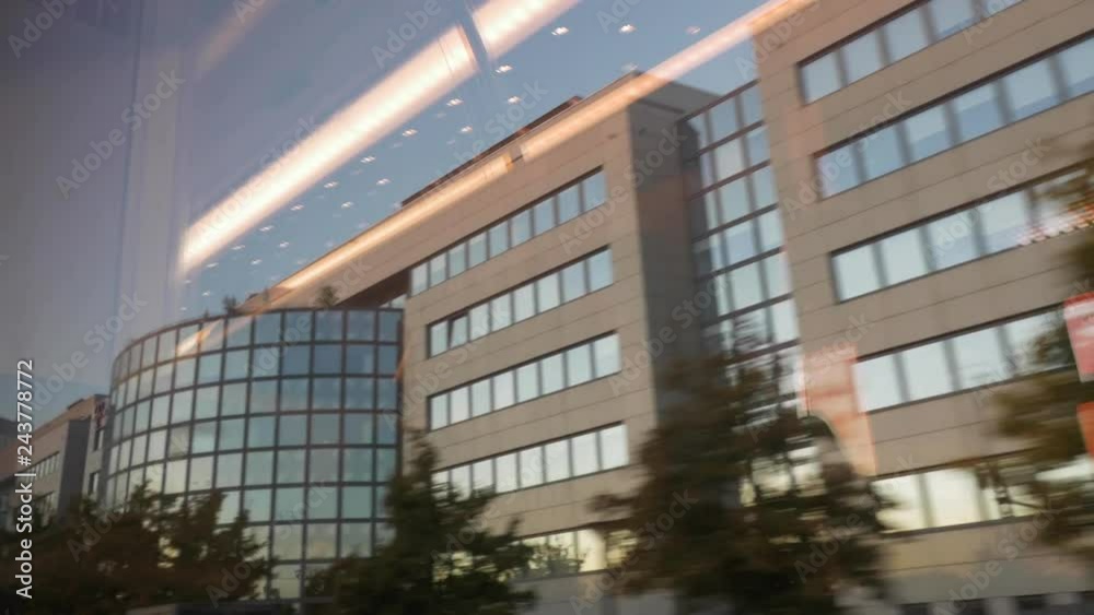 Modern City Architecture Through the Window of a Moving Streetcar