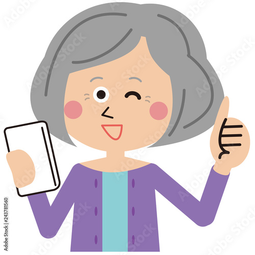 スマホを操作に成功するシニアのかわいい女性