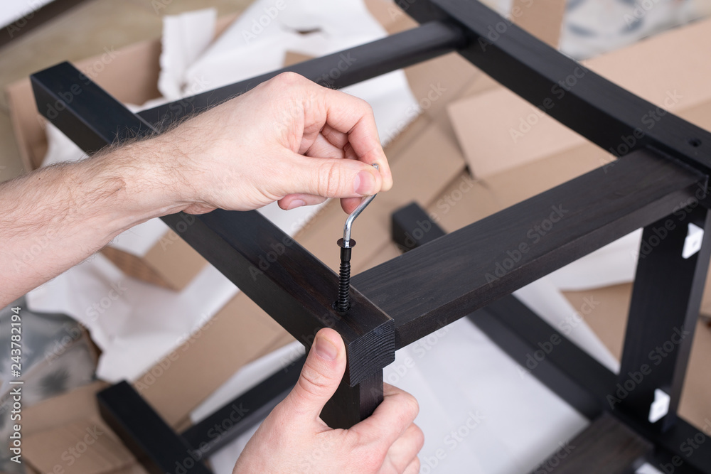 the process of furniture assembly screws closeup the process of furniture assembly screws closeup