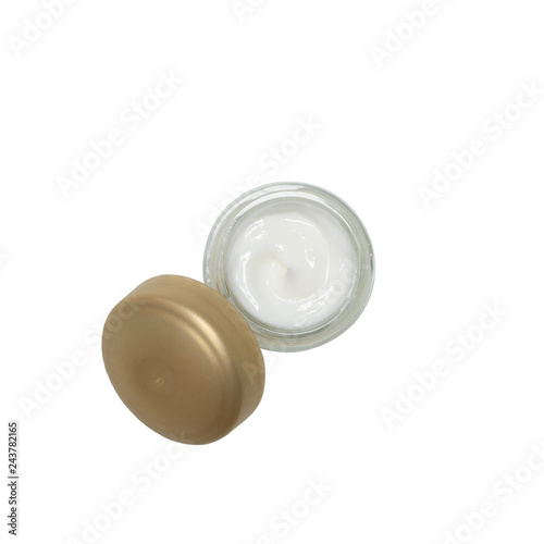 Cosmetic cream in a glass jar isolated on white background. Top view. close up of beauty cream container.