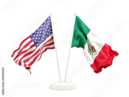 Two waving flags of United States and mexico