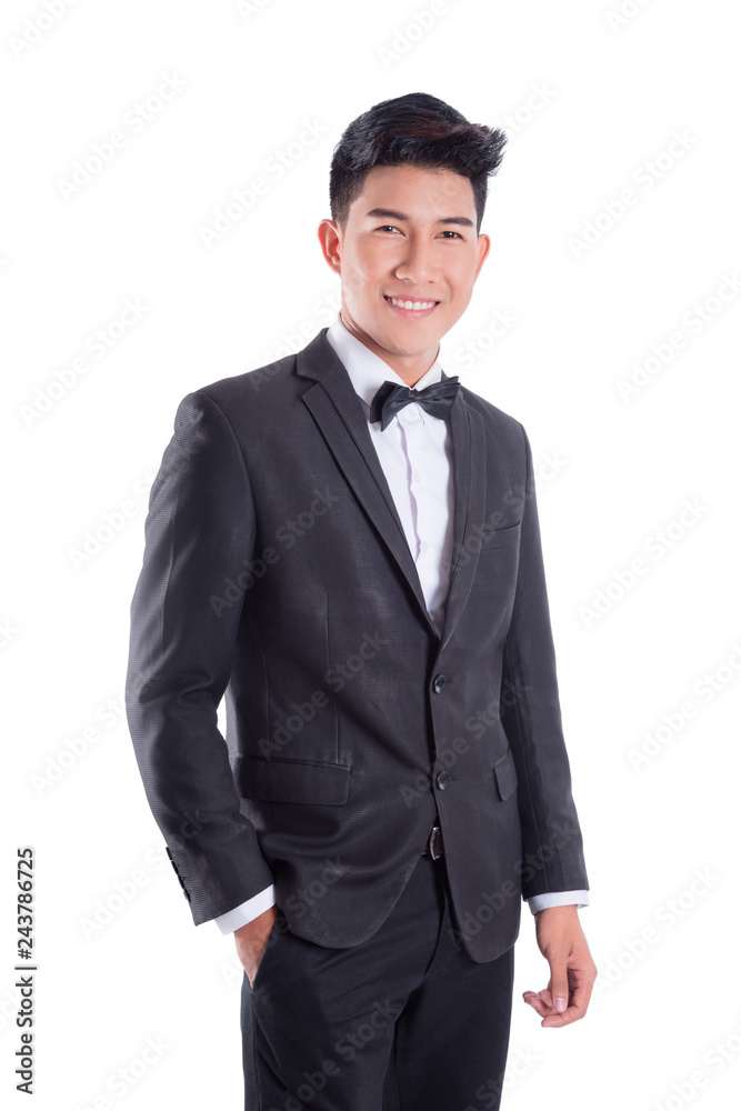 Portrait of young asian confident man dressed in tuxedo with bow tie isolated on white background Portrait of young asian confident man dressed in tuxedo with bow tie isolated on white background