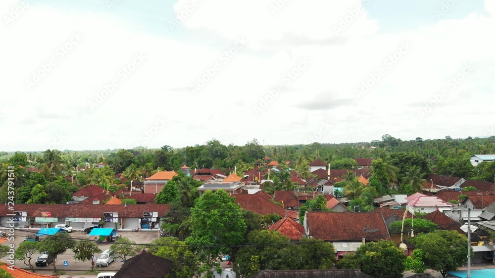 Fototapeta premium Flying with drone over balinese traditional temple. 4K aerial view footage, no edit.