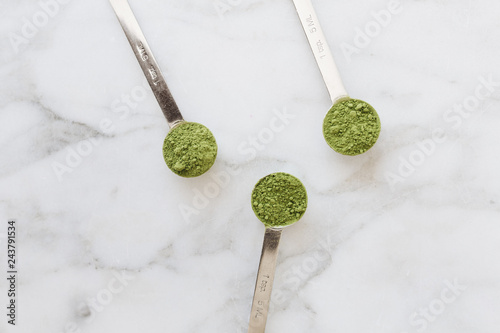 Teaspoons of Matcha on Marble Backdrop