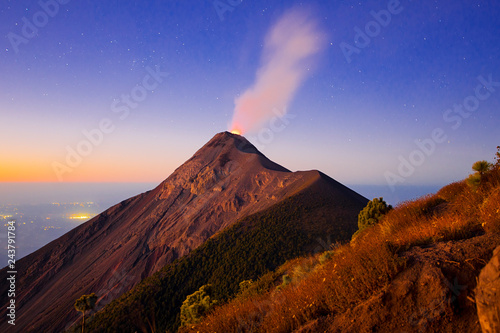 Volcano erupting at sunrise in Guatemala 