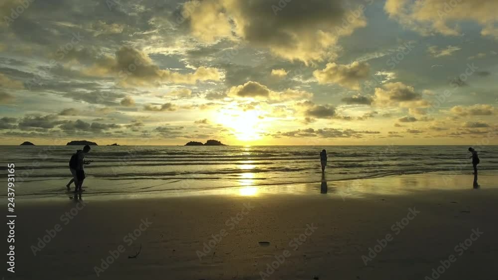 Aerial view of group observing a scenic sunset, Ko Chang, Thailand. Aerial view of group observing a scenic sunset, Ko Chang, Thailand.