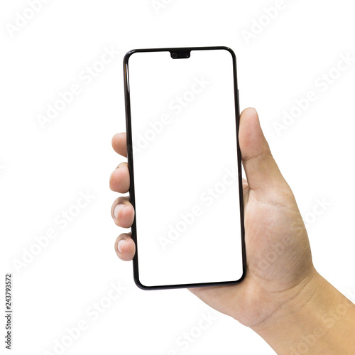 Man holding a black mobile phone with blank screen isolated on a white background. photo