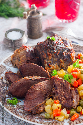 Baked beef with vegetables, selective focus