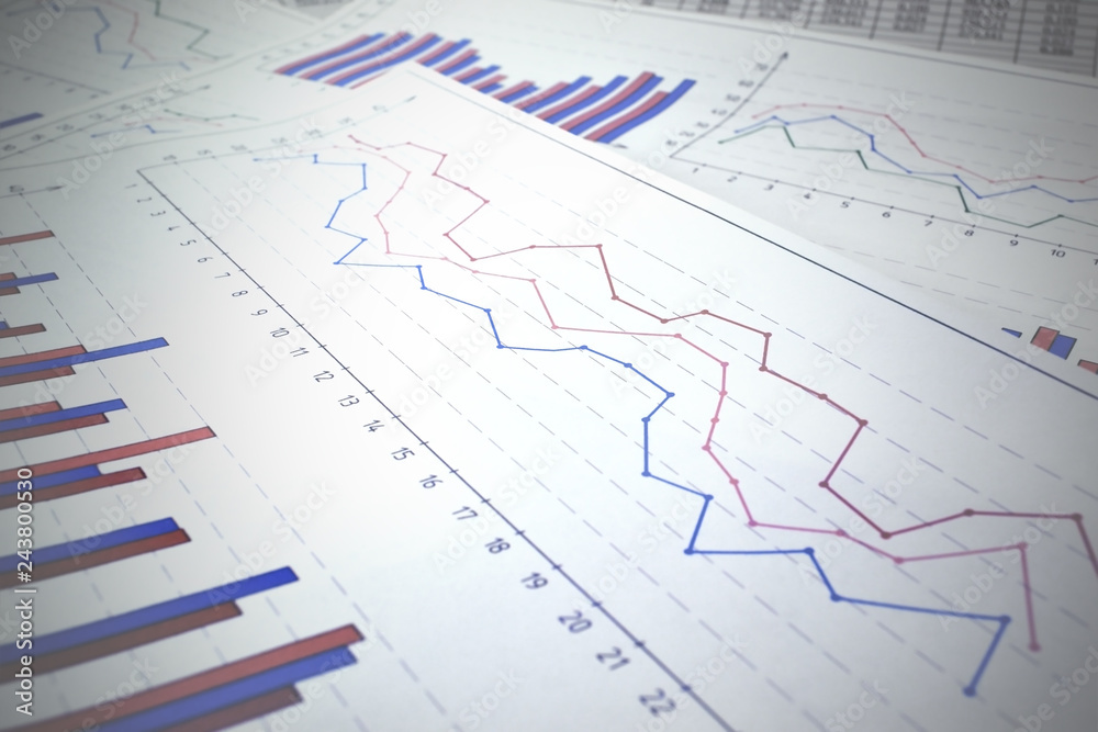 Photo lines graphs and diagrams on a paper document Photo lines graphs and diagrams on a paper document