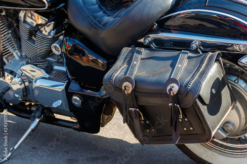 Leather biker bag on a motorcycle close-up. Concept travel on a motorcycle © olyasolodenko