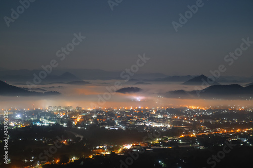 The atmosphere at night over the city of Loei Province when viewed from the peak of Phu Bo Bid.