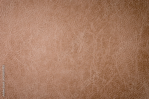 Textured background surface of leather upholstery furniture close-up. burlap brown color fabric structure