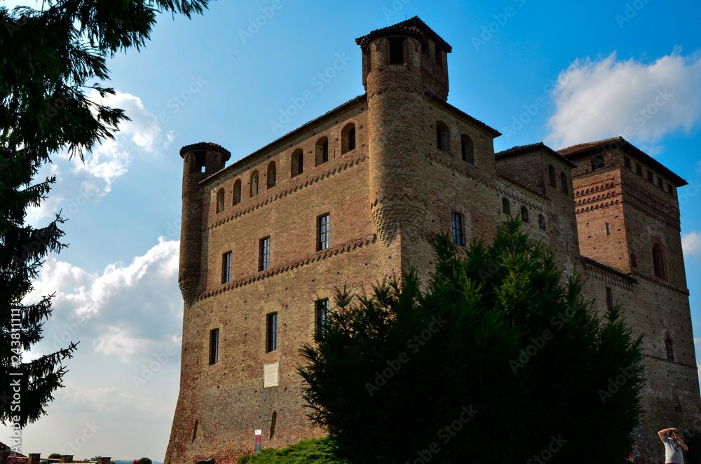 Grinzane Cavour, Piedmont, Italy. July 2018. The majestic castle made of red bricks.