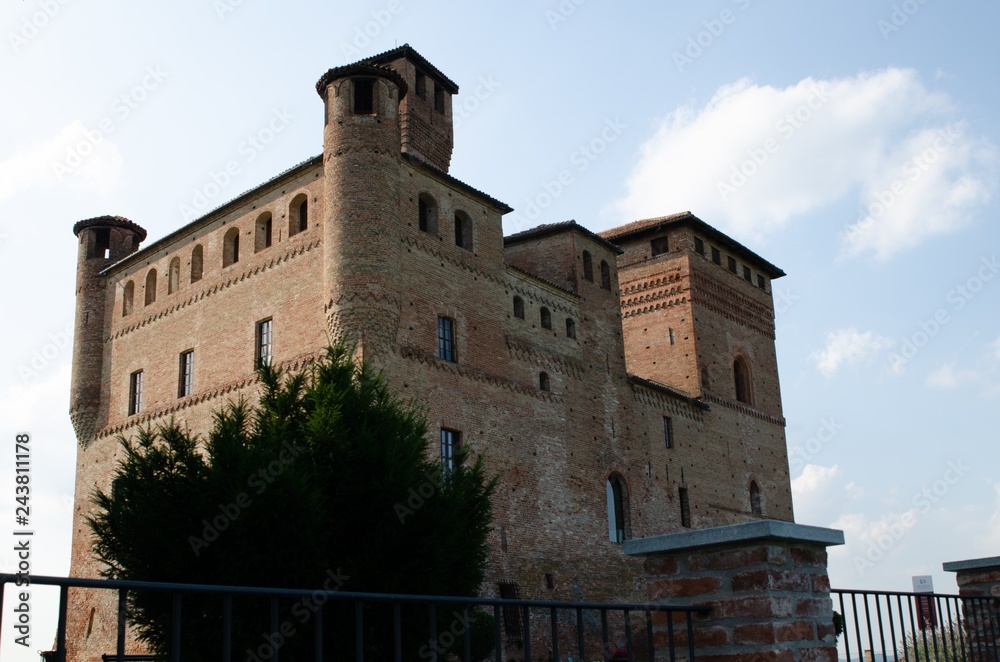 Grinzane Cavour, Piedmont, Italy. July 2018. The majestic castle made of red bricks.