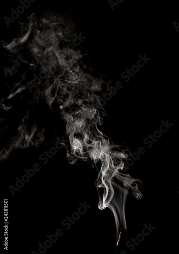 Fototapeta Naklejka Na Ścianę i Meble -  jet of smoke on a black background