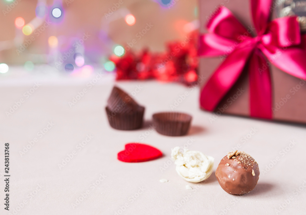 Chocolate and heart on St. Valentine's day love. The concept of postcards for lovers. Close up. Selective focus. Chocolate and heart on St. Valentine's day love. The concept of postcards for lovers. Close up. Selective focus.