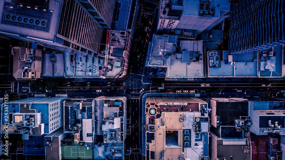 City streets at dusk as seen from above. Aerial photograph