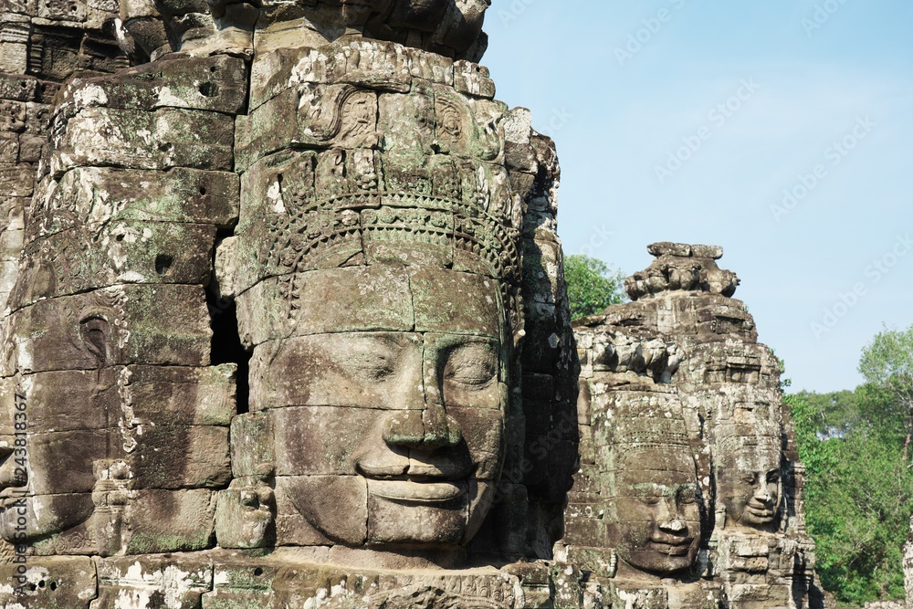 Siem Reap,Cambodia-Januay 11, 2019: Three Bodhisattva faces of Angkor Thom, Siem Reap
