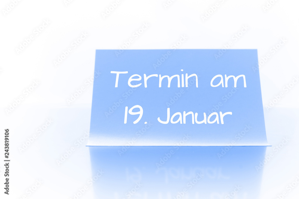 Termin am 19. Januar - blauer Zettel mit Notiz Termin am 19. Januar - blauer Zettel mit Notiz