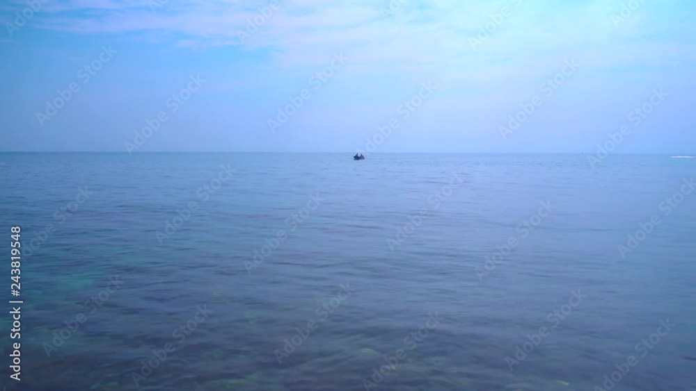 Seascape, sea view in sunny day, dark blue sea, blue sky, small clouds, calm sea surface, ripple soft waves. Seascape, sea view in sunny day, dark blue sea, blue sky, small clouds, calm sea surface, ripple soft waves.