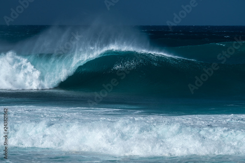 Perfectly shaped surfing wave - Banzai Pipline. The North Shore of Oahu, Hawaii photo