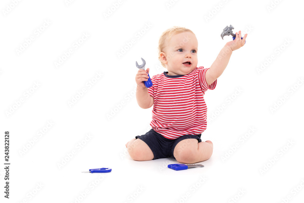 Child playing with instruments isolated on white background Child playing with instruments isolated on white background