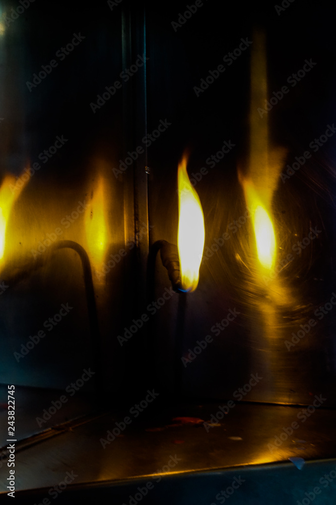 Naklejka premium fire in fireplace